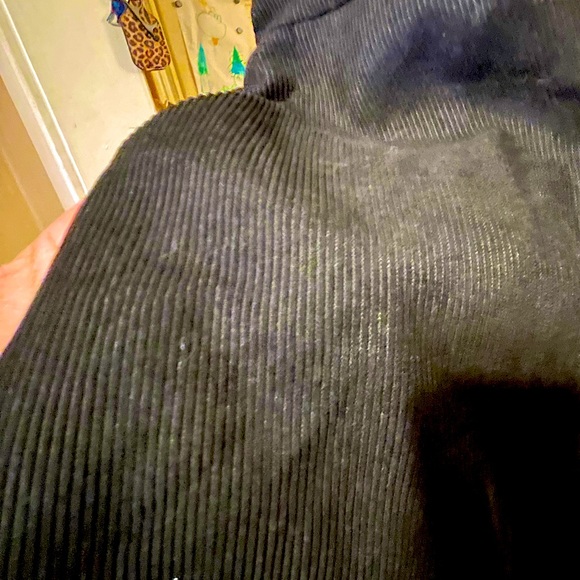 Black corduroy overall jumper dress with red sequin heart detail. - Picture 4 of 4